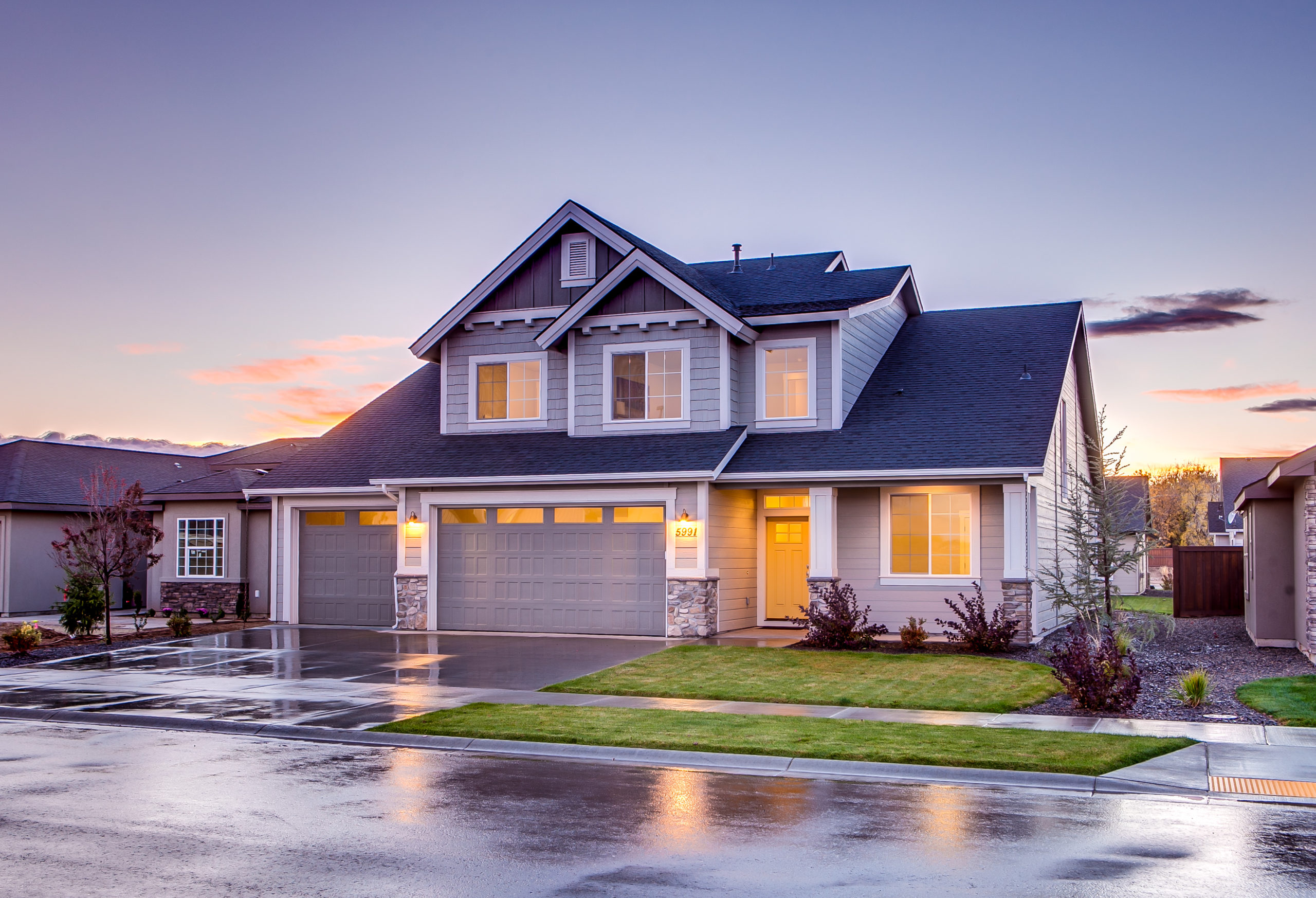 blue-and-gray-concrete-house-with-attic-during-twilight-186077